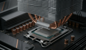 Close-up view of a massive CPU cooler with copper heat pipes and aluminum fins inside a Falcon trading computer chassis.