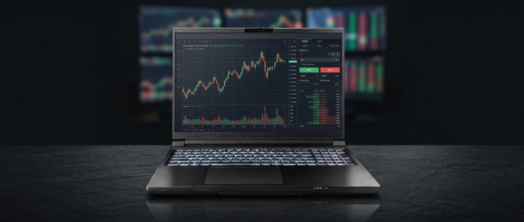 Falcon MI-12 private AI trading laptop with charts on its 2560×1600 screen